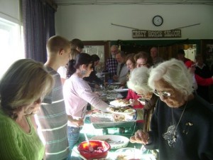 Volunteers serve guest at the 2013 Senior Christmas Dinner