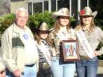 Leona Valley Gymkhana presents John Seymour with a photo thanking Leona Valley Sertoma for there years of support.